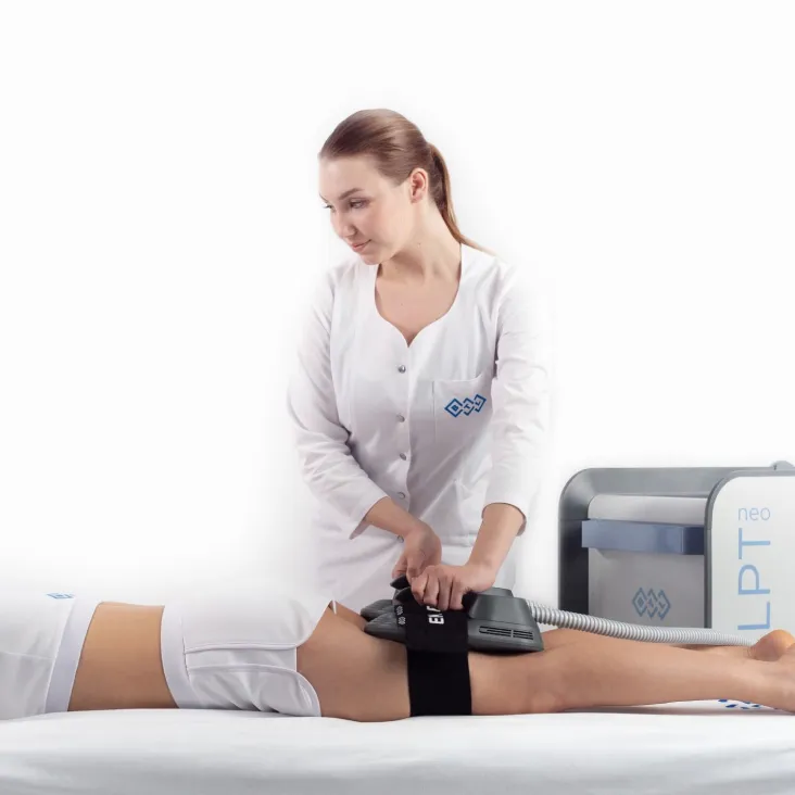 Chiropractic Technician Using Emsculpt Neo on Patient in Missoula, MT.